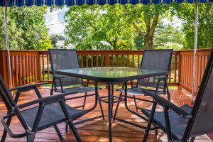 Deck with landscaping How Landscaping Can Improve The Value of Your Home